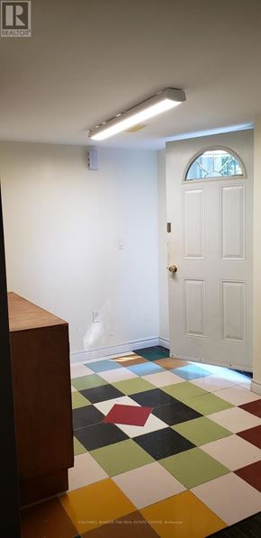Markham (Grandview) apartment for rent - A white door is in a room with a checkered floor.