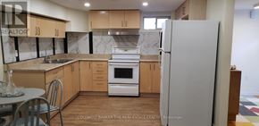 Markham (Grandview) apartment for rent - A kitchen with a refrigerator, sink, and oven.