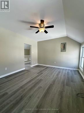 St. Thomas multi-family for rent - A room with a ceiling fan and wood flooring.