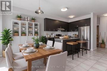 Norfolk (Simcoe) apartment for rent - A modern kitchen with a dining table set for two.