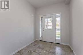 Norfolk (Simcoe) apartment for rent - A room with a white door and tiled floor.