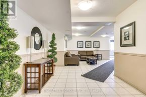Toronto (Clairlea-Birchmount) condo for rent - A living room with a couch, chair, and potted plant.