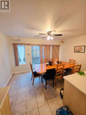 Georgina (Keswick South) apartment for rent - A dining room with a table set for six.