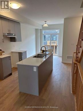 Oshawa (Donevan) townhouse for rent - A kitchen with a sink and a window.