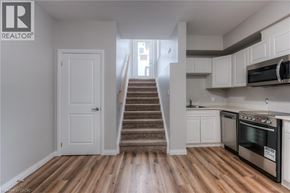 Kitchener apartment for rent - A white door is in the hallway.