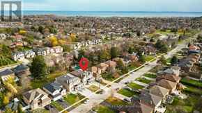 Toronto (Centennial Scarborough) apartment for rent - A bird's eye view of a residential neighborhood with houses and streets.