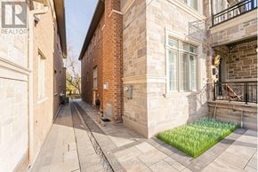 Toronto (Centennial Scarborough) apartment for rent - A stone building with a sign that says REALTOR.