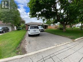 Markham (Bullock) apartment for rent - A residential street with cars parked on the side.
