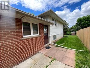 Markham (Bullock) apartment for rent - A brick house with a white door and a window.