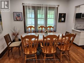 Niagara Falls (Cherrywood) apartment for rent - A dining room with a table set for six.