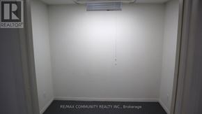 Pickering (Brock Ridge) apartment for rent - A white room with a sign that says REALTOR.