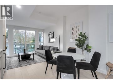 North Vancouver apartment for rent - A modern living room with a dining table set up.