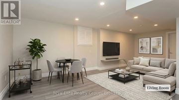 London South (South Q) apartment for rent - A living room with a dining table and chairs.