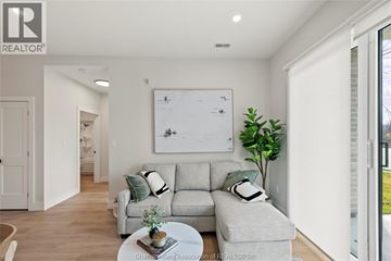 Chatham apartment for rent - A living room with a grey couch and a coffee table.