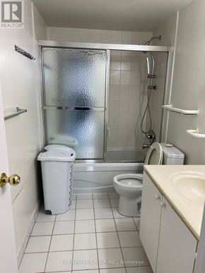 Toronto (O'connor-Parkview) condo for rent - A small white bathroom with a toilet, sink, and shower.