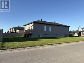 Alfred And Plantagenet apartment for rent - A house with a grey facade is for sale in Brokerage by RE/MAX Delta Realty.