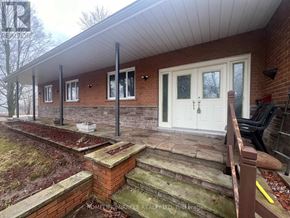 Caledon (Palgrave) apartment for rent - A house with a white door and windows is shown.