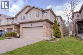 Waterloo townhouse for rent - A large house with a garage is for sale.