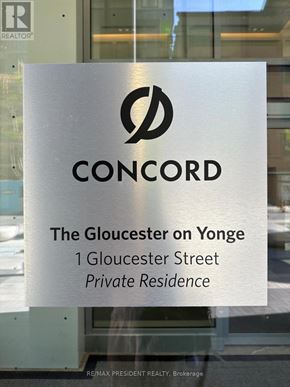 Toronto (Church-Yonge Corridor) condo for rent - A sign for Concord reads "The Gloucester on Yonge" in front of a window.