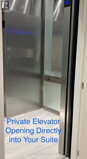 Toronto (Church-Yonge Corridor) condo for rent - A private elevator with a blue light indicating it is open.