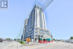 Milton (Co Coates) condo for rent - A tall building with many windows is under construction with a sign that says REALTOR.