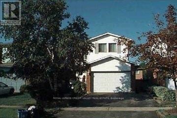 Brampton (Madoc) apartment for rent - A house with a white garage door is for sale in Royal LePage Credit Valley Real Estate, Brockville.