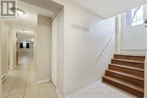 Clarence-Rockland apartment for rent - A hallway with a staircase and a coat rack.