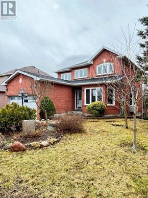 Newmarket (Summerhill Estates) apartment for rent - A red brick house with a white door and windows.