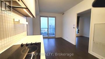 Vaughan (Vaughan Corporate Centre) condo for rent - A kitchen with a sink and a window.