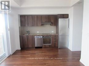 Toronto (Agincourt South-Malvern West) condo for rent - A kitchen with wooden cabinets and stainless steel appliances.
