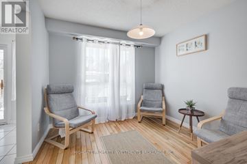 Oshawa (Pinecrest) apartment for rent - A living room with two chairs and a table.