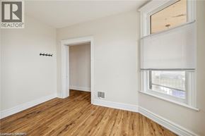 Hamilton apartment for rent - A room with a window and a door.
