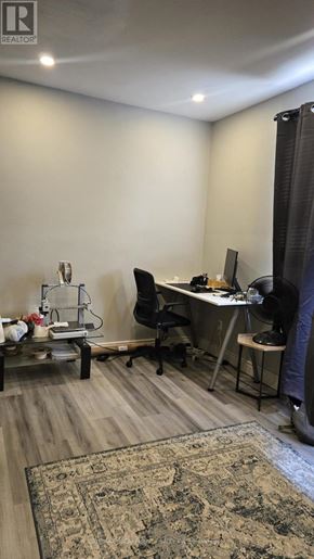 Hamilton (Ainslie Wood) condo for rent - A room with a desk, chair, and a rug.