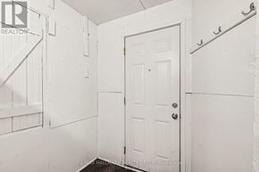 Ottawa condo for rent - A white door is in a white room.