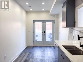 Richmond Hill (Mill Pond) apartment for rent - A kitchen with a sink and a window.