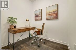 Beamsville condo for rent - A room with a desk, chair, and two paintings on the wall.
