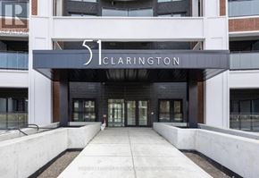 Clarington (Bowmanville) condo for rent - The entrance to a building named Clarington with a black and white sign.