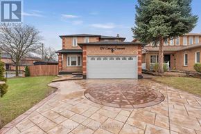 Brampton (Northwood Park) apartment for rent - A brick house with a driveway in front.