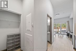 Hamilton (Ainslie Wood) condo for rent - A white room with a door leading to a balcony.