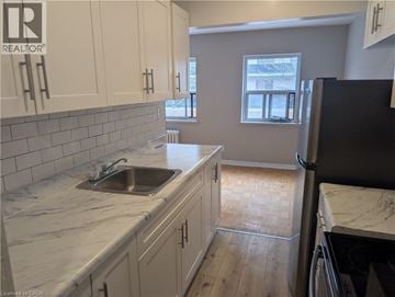 Burlington apartment for rent - A kitchen with a sink and cabinets.