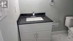 London East (East D) apartment for rent - A bathroom with a sink and toilet.