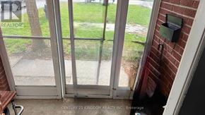 Toronto (West Hill) apartment for rent - A glass door with a handle and a mailbox on the wall.