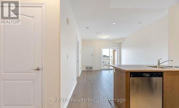 Milton (Cl Clarke) condo for rent - A kitchen with a sink and a dishwasher.