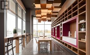Markham (Unionville) condo for rent - A modern dining area with wooden furniture and a glass table.