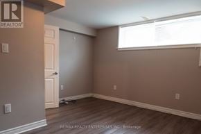 Hamilton (Hampton Heights) apartment for rent - A room with a door and a window.