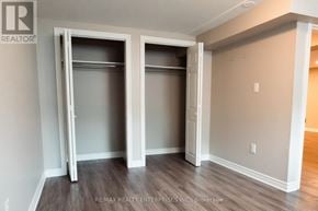 Hamilton (Hampton Heights) apartment for rent - A room with two open closets and a wooden floor.