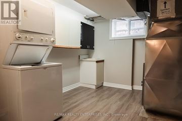 Hamilton (Hampton Heights) apartment for rent - A small kitchen with a stove top oven and a microwave.