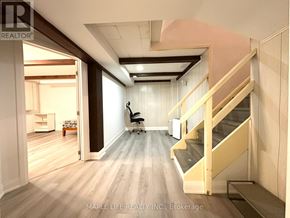 Toronto (L'amoreaux) apartment for rent - A room with a staircase and a chair.