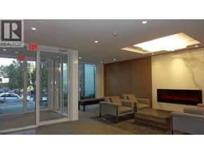 Vancouver apartment for rent - A waiting area with a fireplace and chairs.