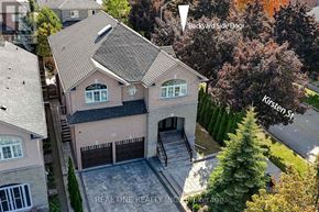 Richmond Hill (Observatory) apartment for rent - A house with a backyard and a side door.